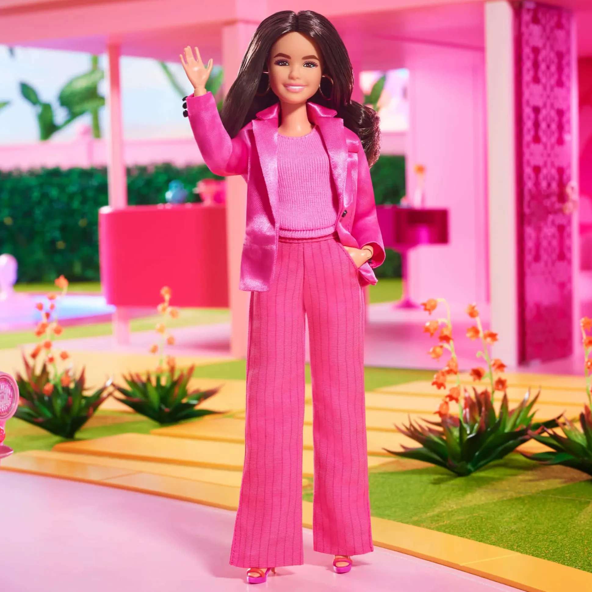 Gloria Doll Wearing Pink Power Pantsuit – Barbie The Movie