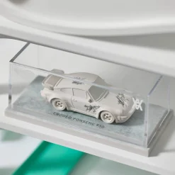 Hot Wheels x Daniel Arsham Eroded Porsche 930 and Rally Case
